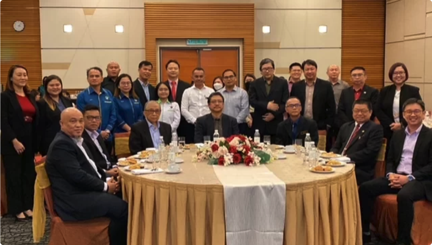 Hazland (seated, fourth left) and Abang Abdul Karim (third left) poses for a photo with guests during SAI World Water Day 2023 at Borneo Convention Centre Kuching on Saturday (March 18)